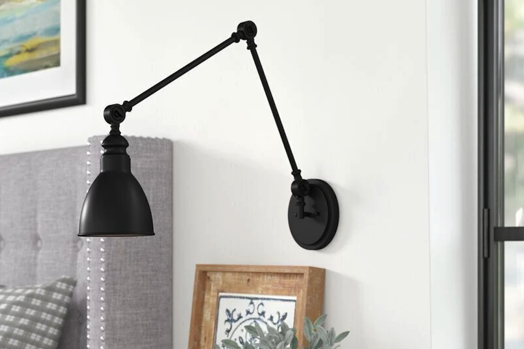 Enhance Your Reading Nook with a Black Adjustable Swing Arm Wall Lamp